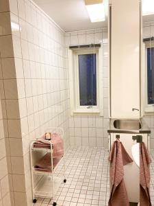 Postel nebo postele na pokoji v ubytování Frost Longstay Sundellsgatan 3 H
