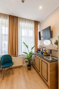 Kuchyňa alebo kuchynka v ubytovaní AR Apartamenty