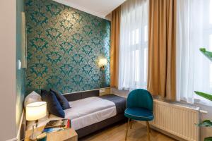 Posteľ alebo postele v izbe v ubytovaní AR Apartamenty