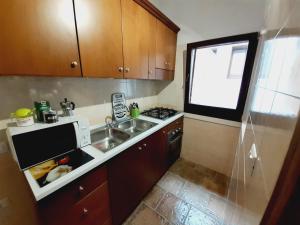 Kuchyň nebo kuchyňský kout v ubytování b&b Stella marina torre guaceto