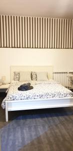 A bed or beds in a room at TREND APARTMENTS