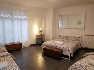 A bed or beds in a room at TREND APARTMENTS