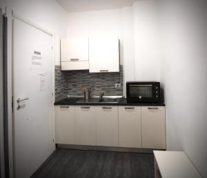 A kitchen or kitchenette at TREND APARTMENTS