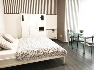 A bed or beds in a room at TREND APARTMENTS