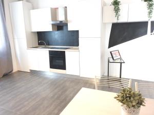 A kitchen or kitchenette at TREND APARTMENTS