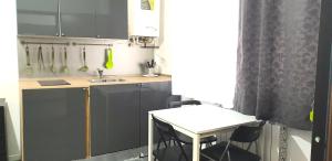 A kitchen or kitchenette at TREND APARTMENTS