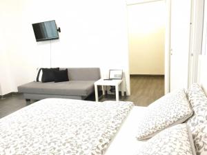 A bed or beds in a room at TREND APARTMENTS