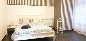A bed or beds in a room at TREND APARTMENTS