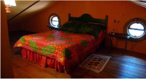 A bed or beds in a room at Cortijo Zalamea