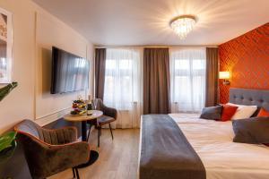Posteľ alebo postele v izbe v ubytovaní AR Apartamenty