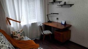 Un pat sau paturi într-o cameră la Апартаменты Амстердам проспект Богдана Хмельницкого