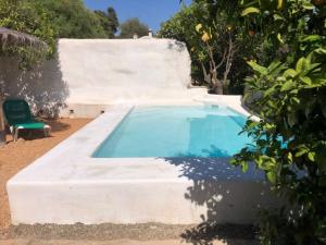 The swimming pool at or close to Casa Cueva El Naranjo Rocabella