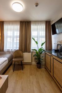Posteľ alebo postele v izbe v ubytovaní AR Apartamenty