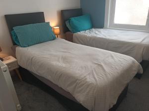 Postel nebo postele na pokoji v ubytování Belgrave View