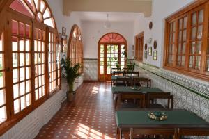 Reštaurácia alebo iné gastronomické zariadenie v ubytovaní Hotel Regio 2