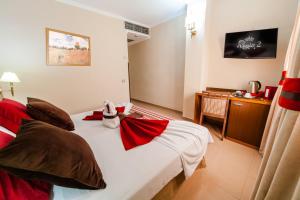 Posteľ alebo postele v izbe v ubytovaní Hotel Regio 2