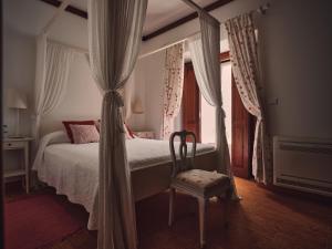Postel nebo postele na pokoji v ubytování Quinta Dos Anjos