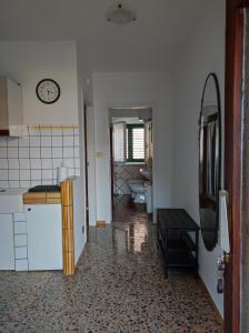 A kitchen or kitchenette at Appartamenti La Terrazza
