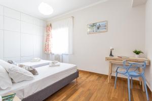 Posteľ alebo postele v izbe v ubytovaní Maison Silvestri