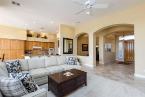 a living room with a couch and a table at Casa Highland home in Fountain Hills