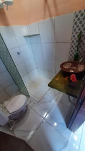 Koupelna v ubytování Casa de temporada Arco das Flores