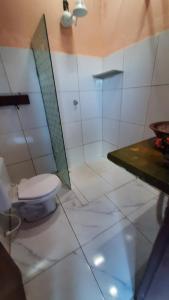 Koupelna v ubytování Casa de temporada Arco das Flores