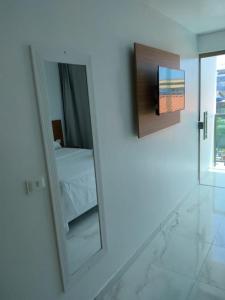TV a/nebo společenská místnost v ubytování Pousada Sky Beach Flat