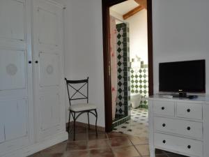 TV a/nebo společenská místnost v ubytování B&B Pubulos
