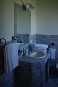 Kylpyhuone majoituspaikassa B&B Pubulos