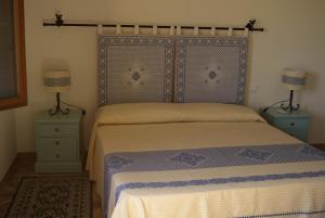 Postel nebo postele na pokoji v ubytování B&B Pubulos