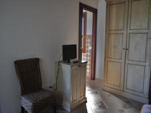 TV a/nebo společenská místnost v ubytování B&B Pubulos