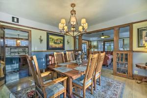 a dining room with a wooden table and chairs at Elegant Superior Getaway Less Than 2 Mi to Downtown! in Superior
