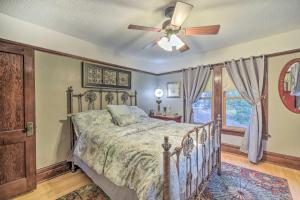 a bedroom with a bed and a ceiling fan at Elegant Superior Getaway Less Than 2 Mi to Downtown! in Superior