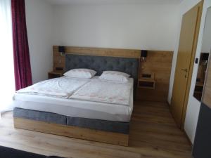 Postel nebo postele na pokoji v ubytování Haus Beutle
