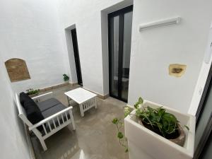 Postel nebo postele na pokoji v ubytování CAMASanlúcar + 10 fotografií