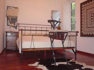 A bed or beds in a room at House Maximo at Colosseum