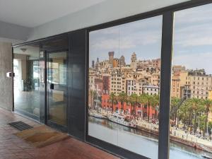 uma vista da cidade a partir de um edifício em La casa sul molo - Acquario em Gênova