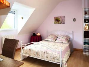 Posteľ alebo postele v izbe v ubytovaní Maison charmante à Pédernec avec jardin spacieux