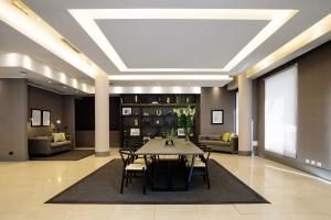 a dining room with a table and chairs at Believe Madero Hotel in Buenos Aires +47 photos