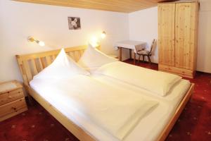 Postel nebo postele na pokoji v ubytování Haus Gariella