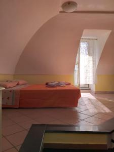 Postel nebo postele na pokoji v ubytování La Casa di Tore
