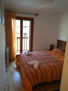 Postel nebo postele na pokoji v ubytování Apartamento Saliecho 3