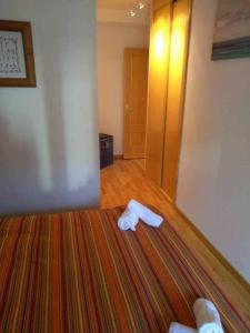 Postel nebo postele na pokoji v ubytování Apartamento Saliecho 3