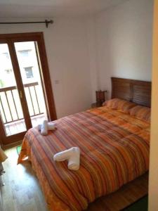 Postel nebo postele na pokoji v ubytování Apartamento Saliecho 3