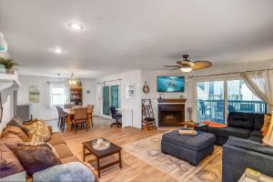 a living room with a couch and a table at Pelican Pointe 2C in Clearwater Beach