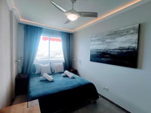 Postel nebo postele na pokoji v ubytování Costamar Getaway + 19 fotografií