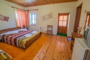 Postel nebo postele na pokoji v ubytování To Petrino Guesthouse