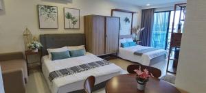 Postel nebo postele na pokoji v ubytování TimurBay Residence 2Bedroom with Seaview 6pax Level10 Kuantan + 14 fotografií