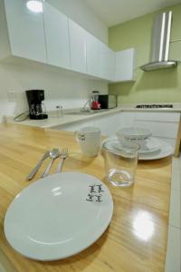 Kuchyň nebo kuchyňský kout v ubytování Shanarani Apartament