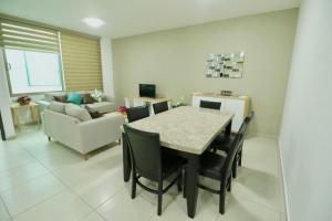 Posezení v ubytování Shanarani Apartament